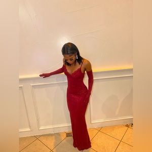 Small maroon gown with gloves has lace feels great I usually wear a medium